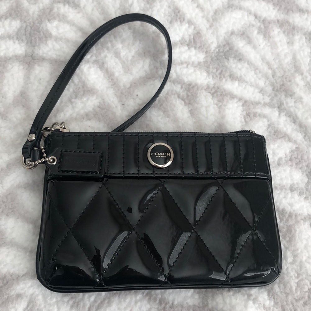 Slightly used black Coach wristlet